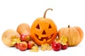 Pumpkin-head, apples and yellow leaves isolated on white background