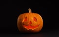 Pumpkin head on black. Jack lantern - traditional Halloween decor