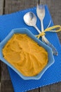 Pumpkin Hummus in a blue bowl