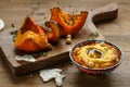 Pumpkin hummus and roasted butternut squash on background