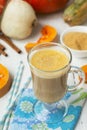 Pumpkin latte - coffee with pumpkin cream and hot drinks. Royalty Free Stock Photo