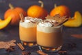 Pumpkin latte drink. Autumn coffee with spicy pumpkin flavor and cream on a dark background. Seasonal Fall Drinks for Halloween