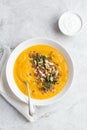 Pumpkin and lentil cream soup in white bowl Royalty Free Stock Photo