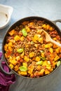 Pumpkin with lentils, sun dried tomatoes and basil Royalty Free Stock Photo
