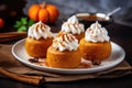 Pumpkin Mini Cakes Baked In Muffin Mold, Topped With Whipped Cream And Spices. Generative AI