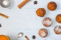 Pumpkin muffins on light blue background with ingredients Royalty Free Stock Photo