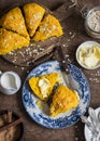 Pumpkin oat scones on wooden table, top view.