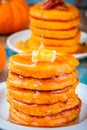 Pumpkin pancakes with honey and butter Royalty Free Stock Photo