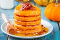 Pumpkin pancakes with honey and pecan Royalty Free Stock Photo