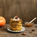 Pumpkin pancakes with pecan nuts Royalty Free Stock Photo