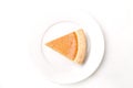 Pumpkin pie from above on white plate Royalty Free Stock Photo