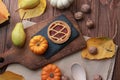 pumpkin pie and fresh autumn fruits and vegetables close-up on the table Royalty Free Stock Photo