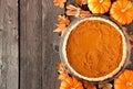 Pumpkin pie overhead table scene on rustic wood Royalty Free Stock Photo