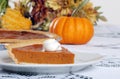 Pumpkin pie and whip cream