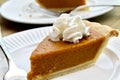 Pumpkin pie on a white plate Royalty Free Stock Photo