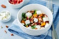 Pumpkin pomegranate pecan arugula goat cheese salad