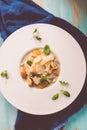 Pumpkin and potatoes gnocchi with mushrooms sauce