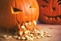 Pumpkin puking with pumpkin seeds on wood table