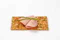 Pumpkin seed cracker with ham salami Royalty Free Stock Photo