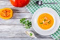 Pumpkin and Shrimp Soup, seeds and fresh cream, top view Royalty Free Stock Photo