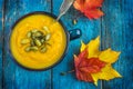 Pumpkin soup on a bowl