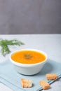 Pumpkin soup in a bowl with fresh dill herb Royalty Free Stock Photo