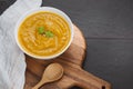 Pumpkin soup in a bowl with garlic and parsley herbs Royalty Free Stock Photo