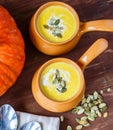 Pumpkin soup in clay pot Royalty Free Stock Photo