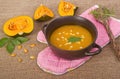 Pumpkin soup in clay pot Royalty Free Stock Photo