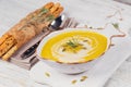 Pumpkin soup with cream and pumpkin seeds