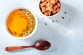 Pumpkin soup with green onions, croutons, and pepper, shot from above