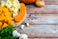 Pumpkin Soup Ingredients. Sliced seasonal vegetables: pumpkin, potatoes and carrots. Copy space Royalty Free Stock Photo
