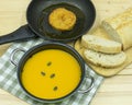 Pumpkin soup, patties in a pan and bread Royalty Free Stock Photo