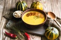 Pumpkin soup with seeds, spices, herbs and croutons