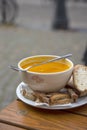 Pumpkin Soup Served In A Street Cafe