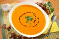 Pumpkin soup in a white bowl