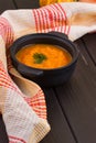 Pumpkin soup on a wooden table Royalty Free Stock Photo