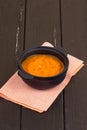 Pumpkin soup on a wooden table Royalty Free Stock Photo