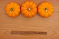 Pumpkin Spice background with a pumpkins and cinnamon sticks on Royalty Free Stock Photo