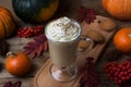 Pumpkin spice coffee latte with whipped cream and cookies Royalty Free Stock Photo