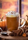 Pumpkin spice latte with autumn background Royalty Free Stock Photo