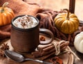 Pumpkin spice latte with autumn background Royalty Free Stock Photo