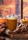 Pumpkin spice latte with autumn background Royalty Free Stock Photo