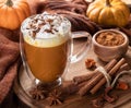 Pumpkin spice latte with autumn background Royalty Free Stock Photo