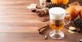 Pumpkin spice latte in a glass mug with cinnamon and ginger Royalty Free Stock Photo