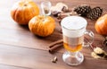 Pumpkin spice latte in a glass mug with cinnamon and ginger Royalty Free Stock Photo