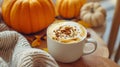 Pumpkin spice latte in glass mug with cinnamon, nutmeg, pumpkin seeds and whipped cream on brown texture wood. Royalty Free Stock Photo