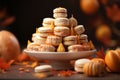 Pumpkin spice latte macarons arranged on a