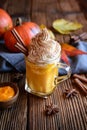 Pumpkin spice latte topped with whipped cream Royalty Free Stock Photo
