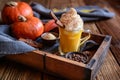 Pumpkin spice latte topped with whipped cream Royalty Free Stock Photo